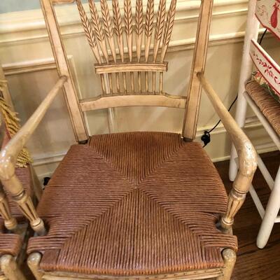 Set of 4 Dining Chairs with Arms and wicker based seats plus 2 pillows - Item Must be Scheduled for Pickup.