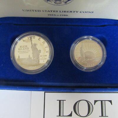 US Mint 1986 S Liberty, Ellis Island Silver Dollar (.77 silver troy oz), and Clad Half Dollar Proof Set, Never Opened