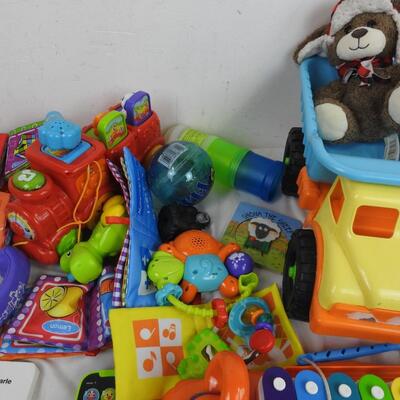 Kid Toy Lot: Dog Xylophone, Dump Truck, Trains, Books, Baby Toys