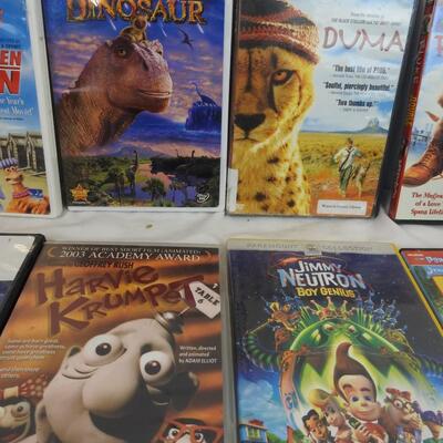16 DVDs:  Alvin the Sequel ( Blank case)- The Many Adventures of Winnie The Pooh