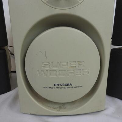 Set of Eastern Speakers and Subwoofer, Turns On