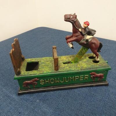 LOT 101.  VINTAGE DIE CAST METAL SHOW JUMPER BANK