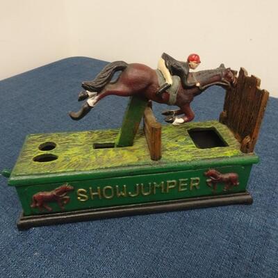 LOT 101.  VINTAGE DIE CAST METAL SHOW JUMPER BANK