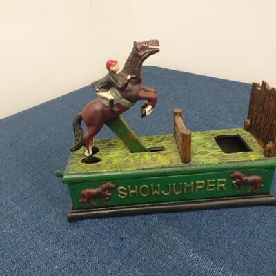 LOT 101.  VINTAGE DIE CAST METAL SHOW JUMPER BANK