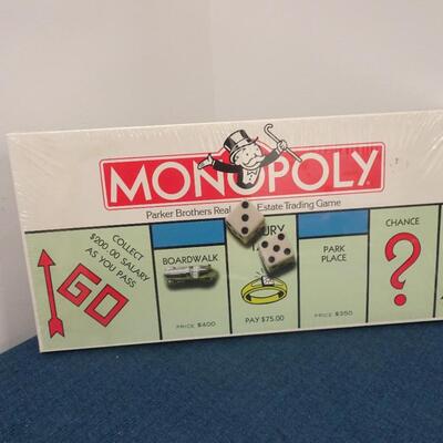 LOT 113. MONOPOLY GAME STILL WRAPPED IN PLASTIC