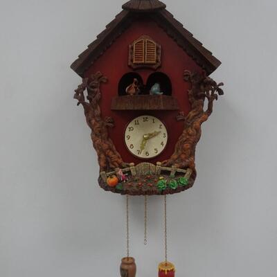 LOT 125  WINNIE THE POOH MUSICAL CUCKOO CLOCK