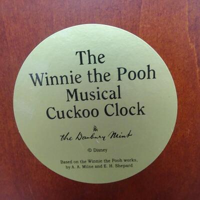 LOT 125  WINNIE THE POOH MUSICAL CUCKOO CLOCK