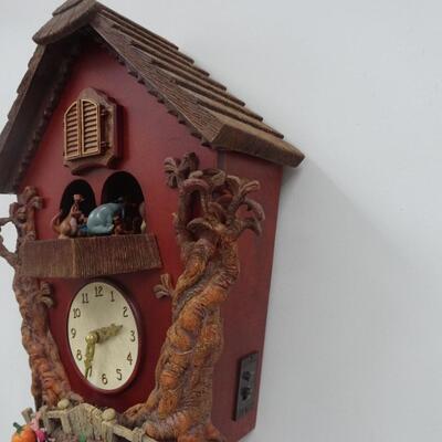 LOT 125  WINNIE THE POOH MUSICAL CUCKOO CLOCK