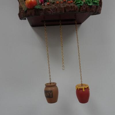 LOT 125  WINNIE THE POOH MUSICAL CUCKOO CLOCK