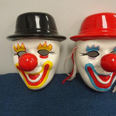 LOT 129. THREE DECORATIVE CLOWN MASK