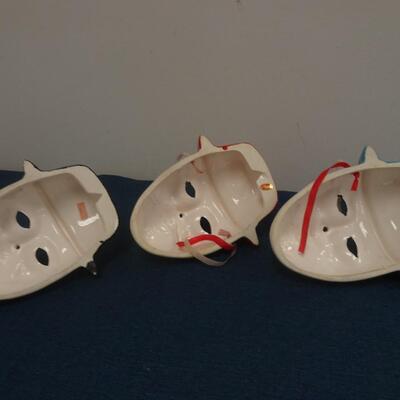 LOT 129. THREE DECORATIVE CLOWN MASK