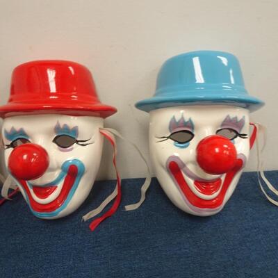LOT 129. THREE DECORATIVE CLOWN MASK