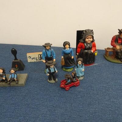 LOT 173. CAST IRON AMISH FIGURINES AND AMISH HOME DECOR