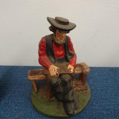 LOT 173. CAST IRON AMISH FIGURINES AND AMISH HOME DECOR