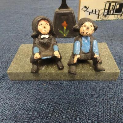 LOT 173. CAST IRON AMISH FIGURINES AND AMISH HOME DECOR
