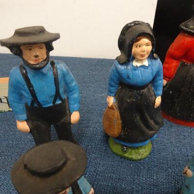 LOT 173. CAST IRON AMISH FIGURINES AND AMISH HOME DECOR