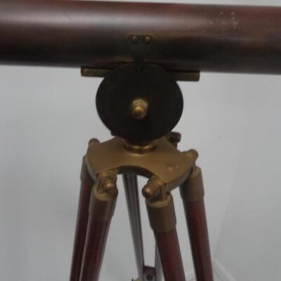 LOT 176. FLOOR TOP BRASS MOUNTED TELESCOPE