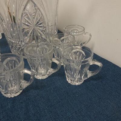 LOT 180 CRYSTAL LIDDED PUNCH BOWL WITH LADLE AND 8 CUPS