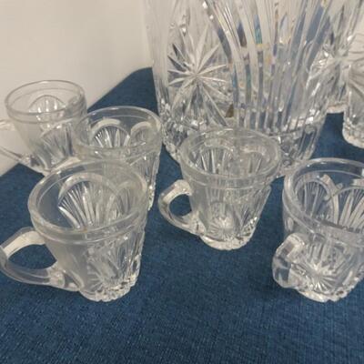 LOT 180 CRYSTAL LIDDED PUNCH BOWL WITH LADLE AND 8 CUPS