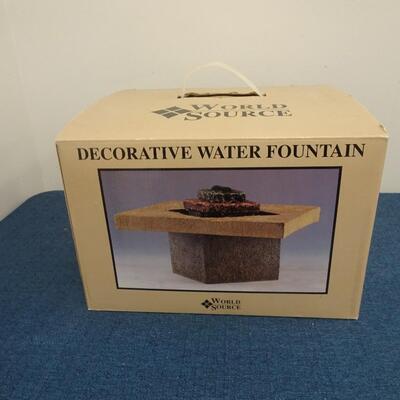 LOT 65. DECORATIVE TABLE TOP WATER FOUNTAIN IN BOX