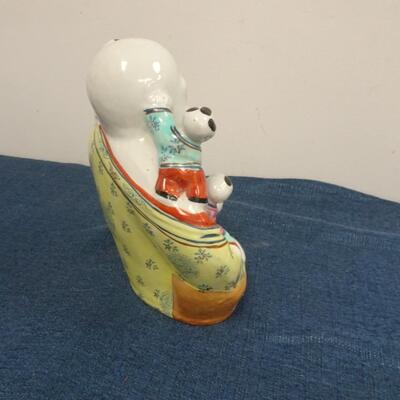 LOT 188. LAUGHING BUDDHA FIGURINE