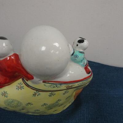 LOT 188. LAUGHING BUDDHA FIGURINE