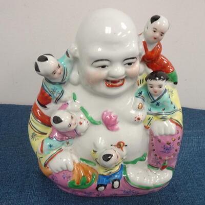 LOT 188. LAUGHING BUDDHA FIGURINE