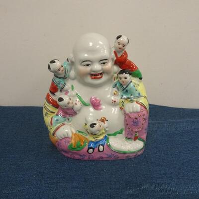 LOT 188. LAUGHING BUDDHA FIGURINE