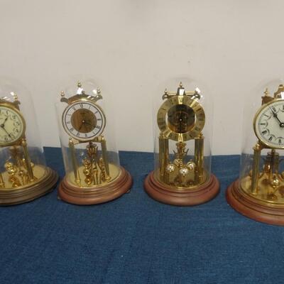 LOT 192. FOUR ANNIVERSARY CLOCKS (NOT TESTED)