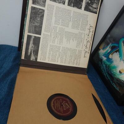 LOT 193. THREE FRAMED ALBUM COVERS AND JUNGLE BOOK ALBUM