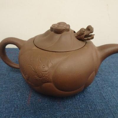 LOT 203. CHINESE DRAGON CLAY TEA POT