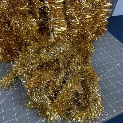 #83 Gold Colored Garland 