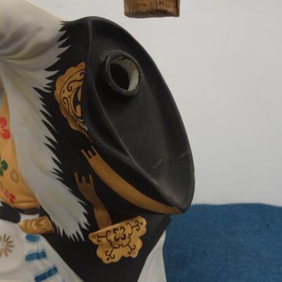 LOT 230. VINTAGE SAKE FIGURAL DECANTER