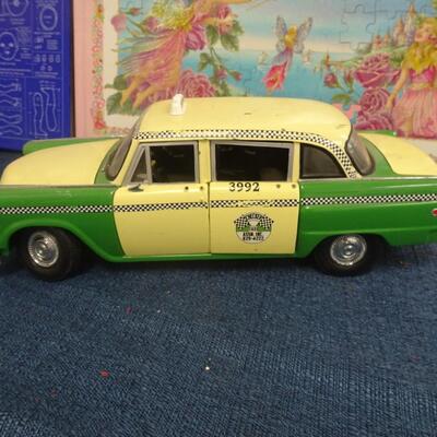 LOT 231. BOOKS, MODEL, TOY CAR AND WALKIE TALKIE SET
