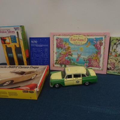 LOT 231. BOOKS, MODEL, TOY CAR AND WALKIE TALKIE SET