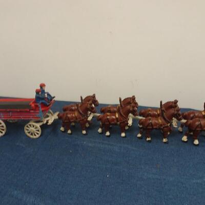 LOT 233. CAST IRON WAGON WITH CLYDESDALES