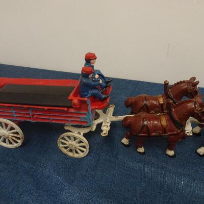LOT 233. CAST IRON WAGON WITH CLYDESDALES
