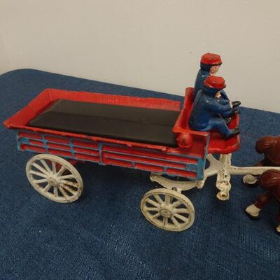 LOT 233. CAST IRON WAGON WITH CLYDESDALES