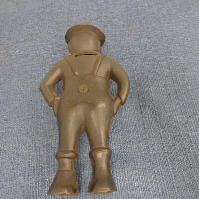 LOT 235  GIVE ME A PENNY CAST IRON BANK