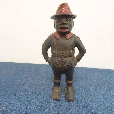 LOT 235  GIVE ME A PENNY CAST IRON BANK