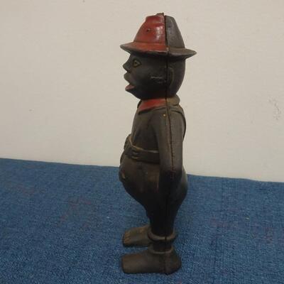 LOT 235  GIVE ME A PENNY CAST IRON BANK