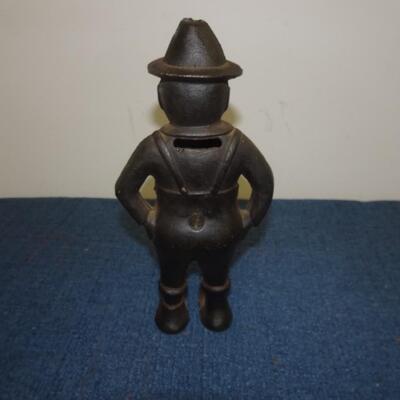 LOT 235  GIVE ME A PENNY CAST IRON BANK