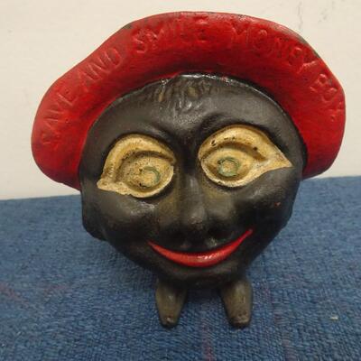 LOT 236.  SAVE AND SMILE MONEY BOX BANK