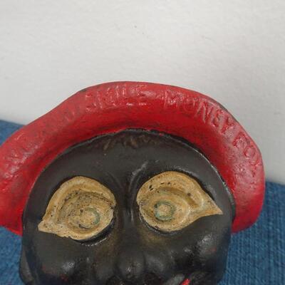 LOT 236.  SAVE AND SMILE MONEY BOX BANK