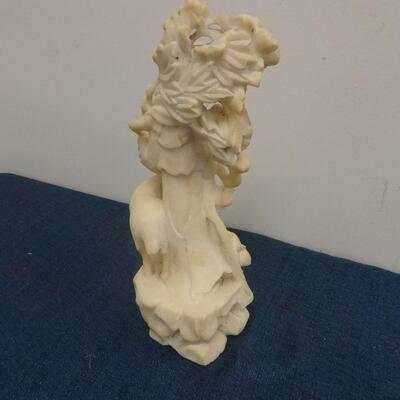 LOT 245. CARVED STONE FIGURINE