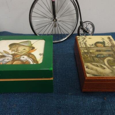 LOT 248. 1/10 SCALE BIKE MISSING ONE PEDAL AND TWO MUSIC BOXES