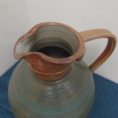 LOT 264. CERAMIC PITCHER