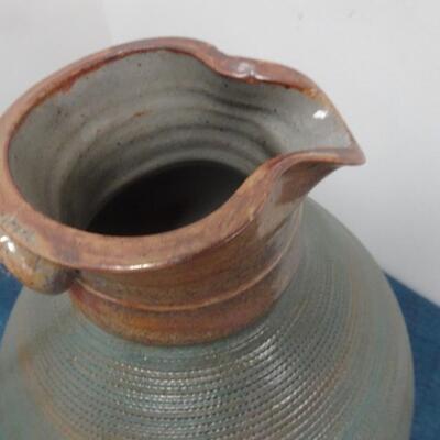 LOT 264. CERAMIC PITCHER