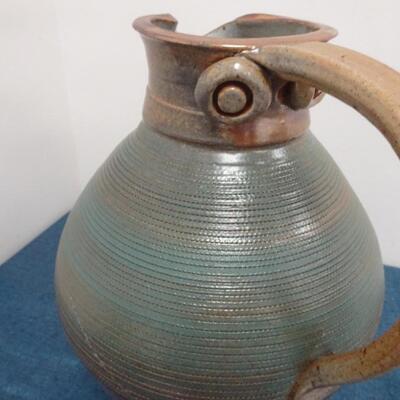 LOT 264. CERAMIC PITCHER