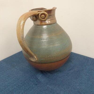 LOT 264. CERAMIC PITCHER